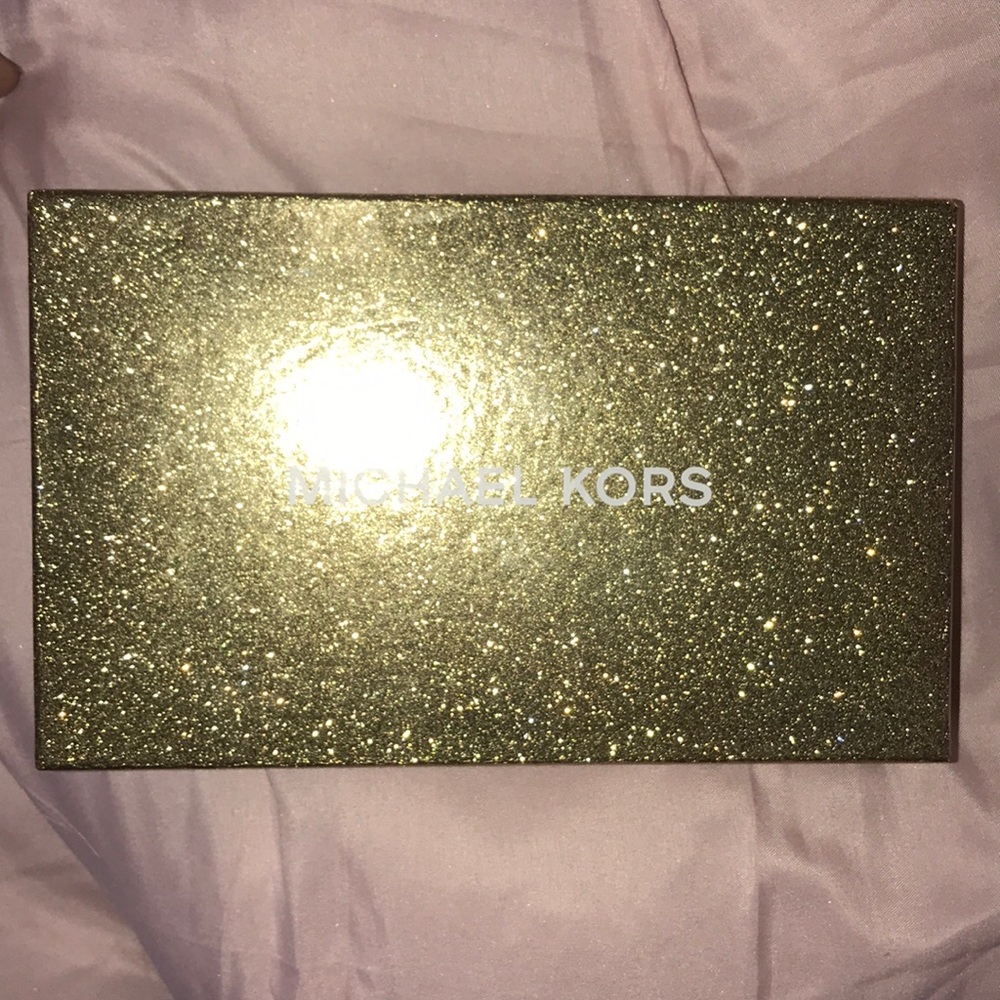 Michael kors wristlet. Never used.